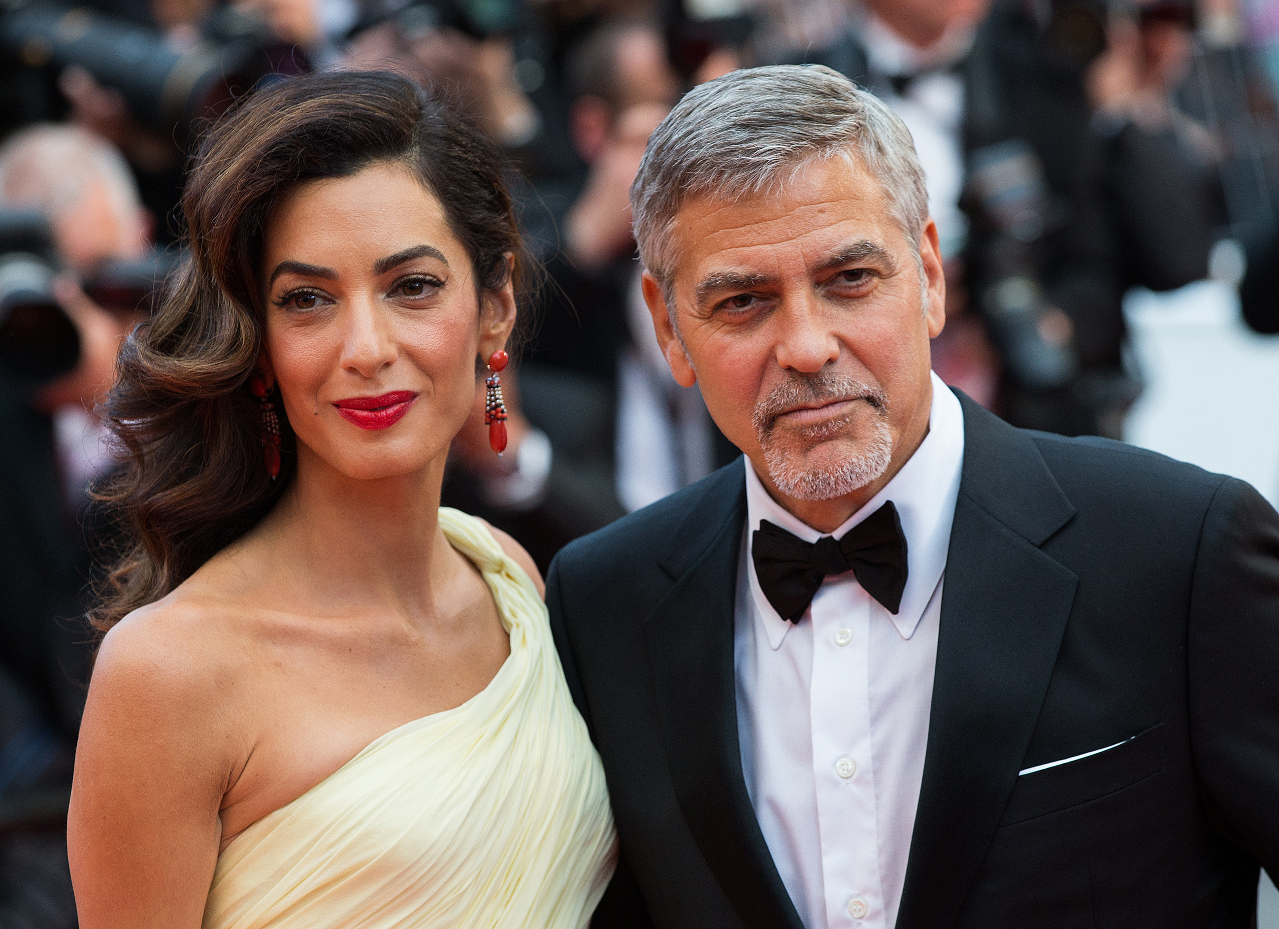 A picture of Amal Alamuddin and George Clooney together at an event.