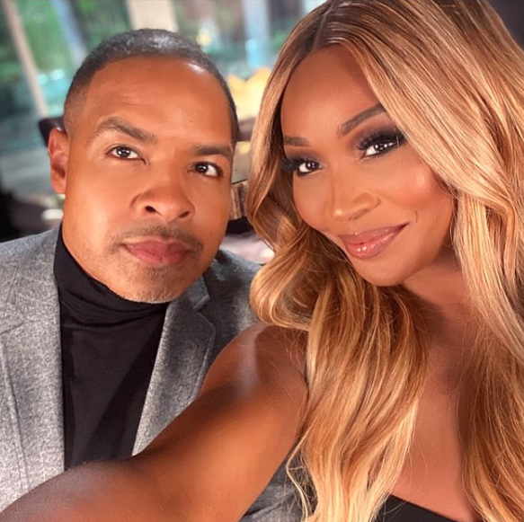 Cynthia Bailey and Mike Hill take a selfie.