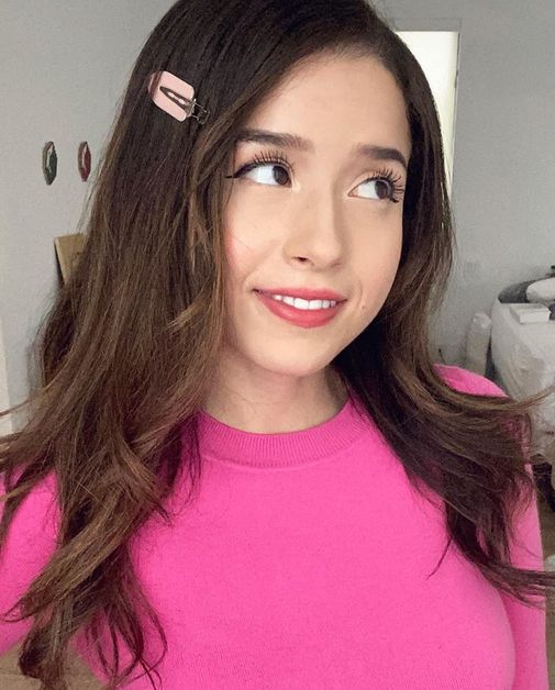 pokimane wearing a pink top