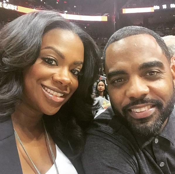 Kandi Burruss smiles with husband Todd Tucker.