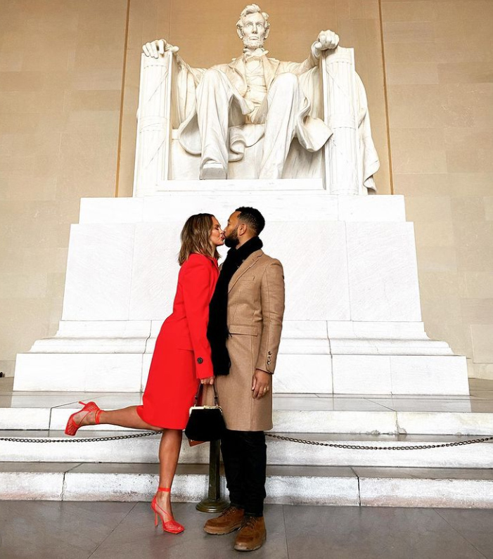 Chrissy Teigen and John Legend steal a kiss