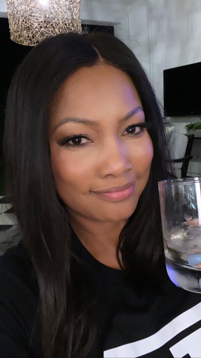 Garcelle Beauvais drinks tequila.
