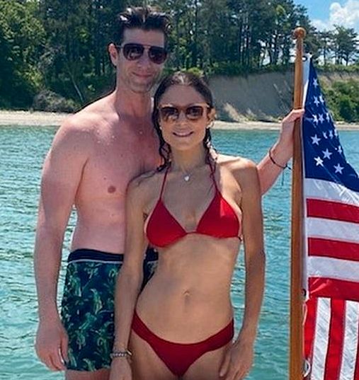 Bethenny Frankel wears a red bikini with Paul Bernon.