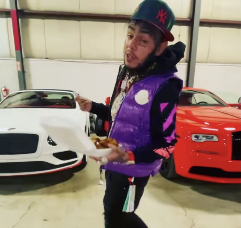 6ix9ine showing off his cars.