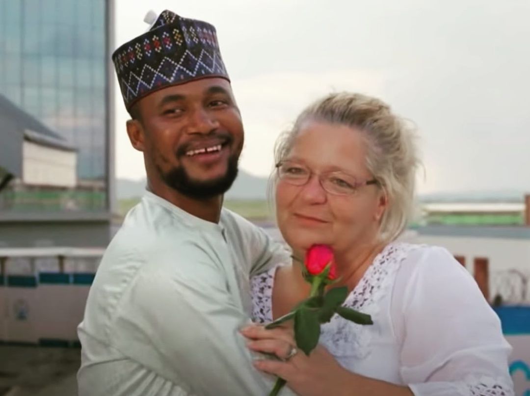 A throw back photo of SojaBoy and his wife, Lisa Hamme hugging itmouit outside.