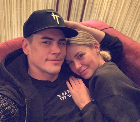 Tom Sandoval and Ariana Madix cuddle at a hotel in San Diego.