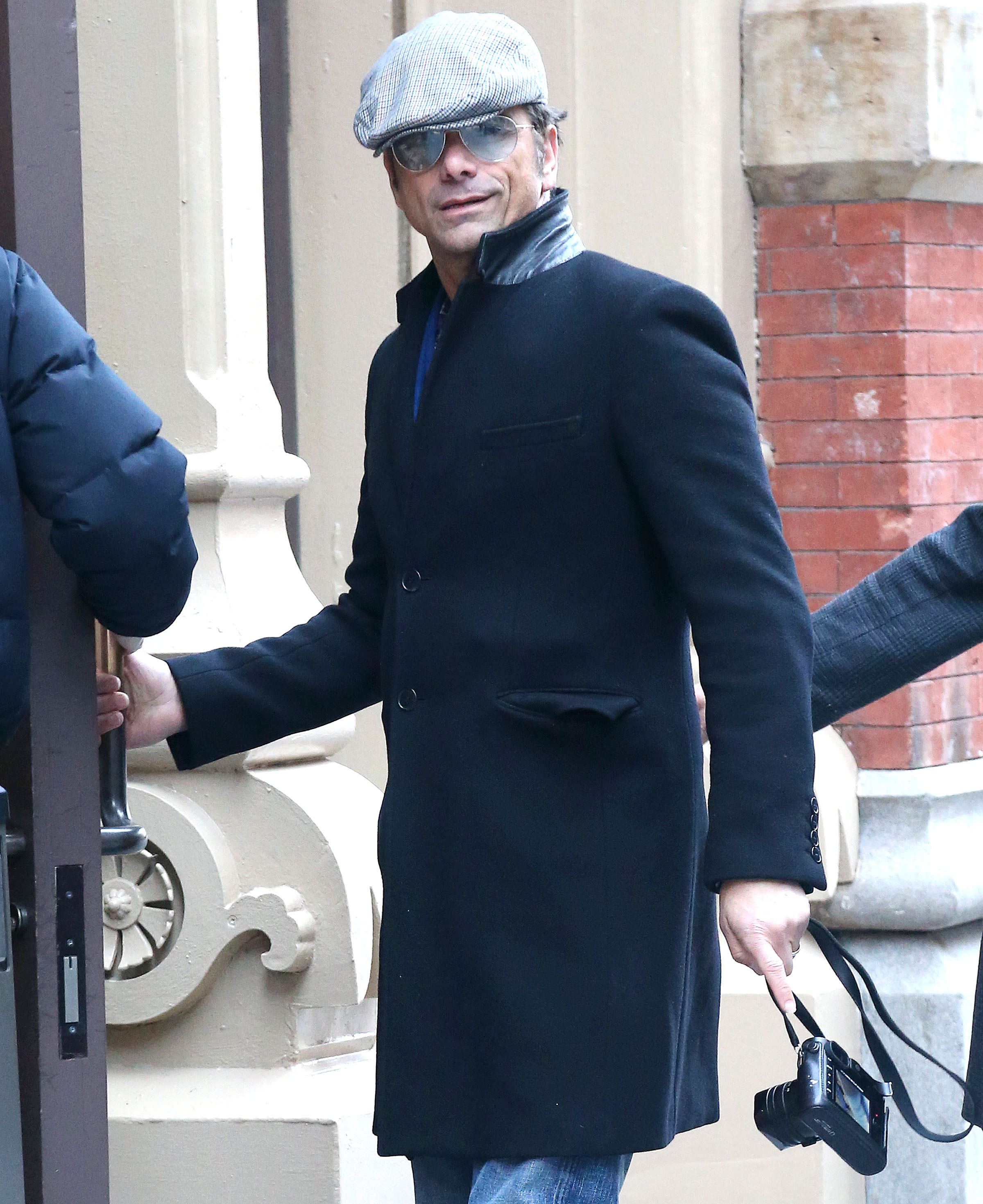 A photo of out and about in a Jacket and denim pant in New York City.