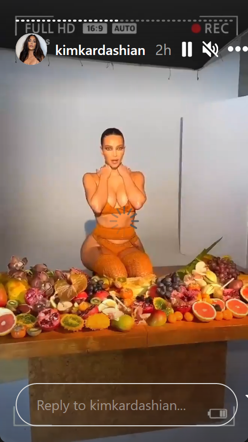 Kim Kardashian on table with fruit