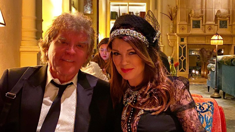 Lisa Vanderpump wears a black hat with Ken Todd.