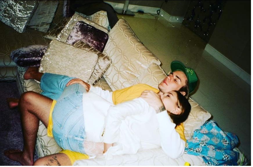 Justin Bieber with Hailey on couch