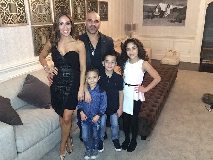 Melissa Gorga and her husband Joe dress up with their kids.