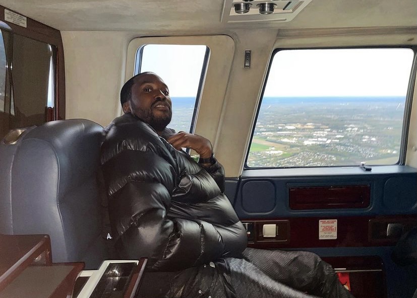 Meek on a private jet.