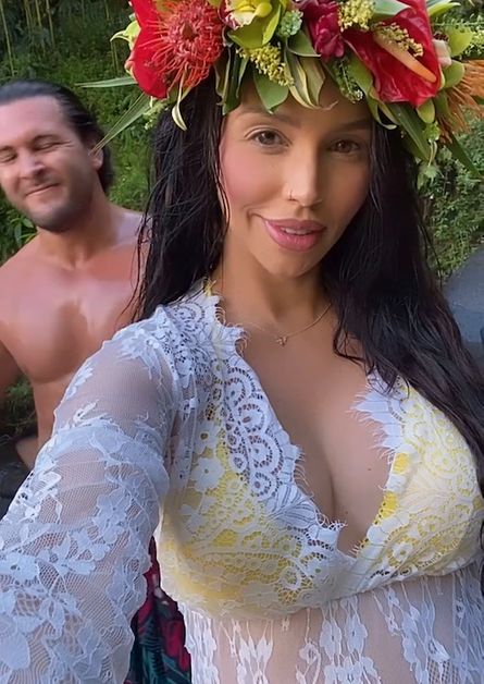 Scheana Shay wears white lace over a yellow bikini.