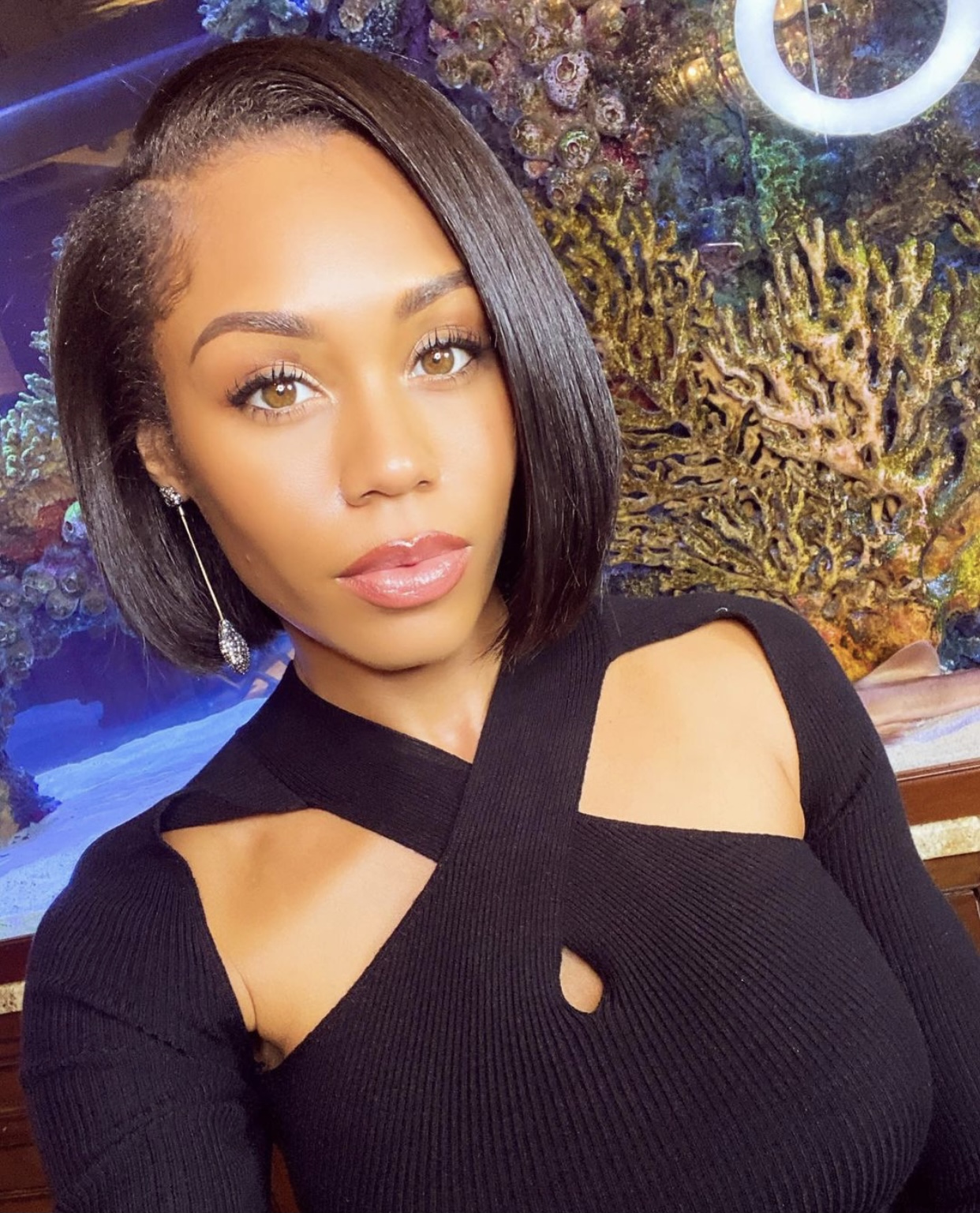 Monique Samuels poses for a selfie