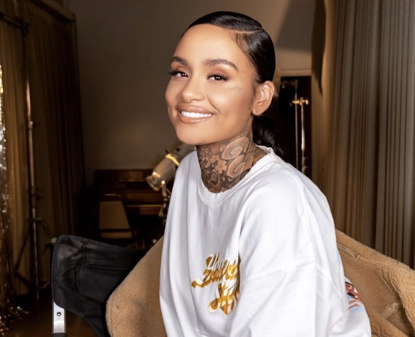 Kehlani smiling for a photo.