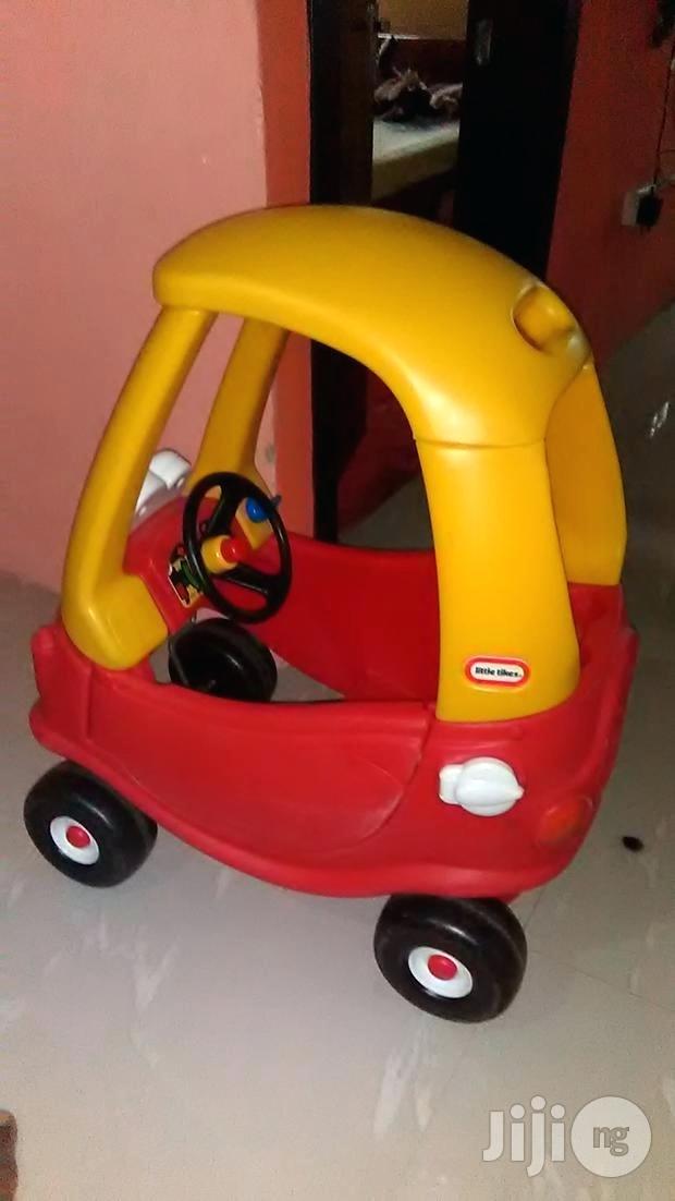 red and yellow ride in car from little tikes