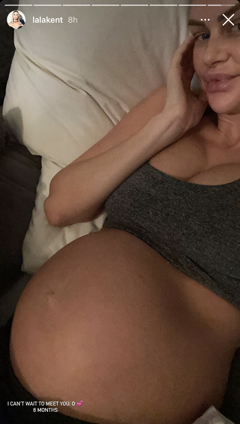 Lala Kent shows off her baby bump at eight months pregnant.