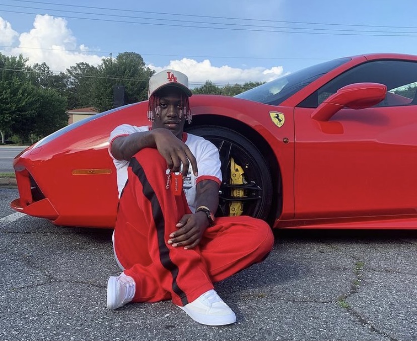 Yachty in front of his Ferrari.