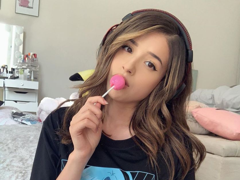 Pokimane licking lollipop