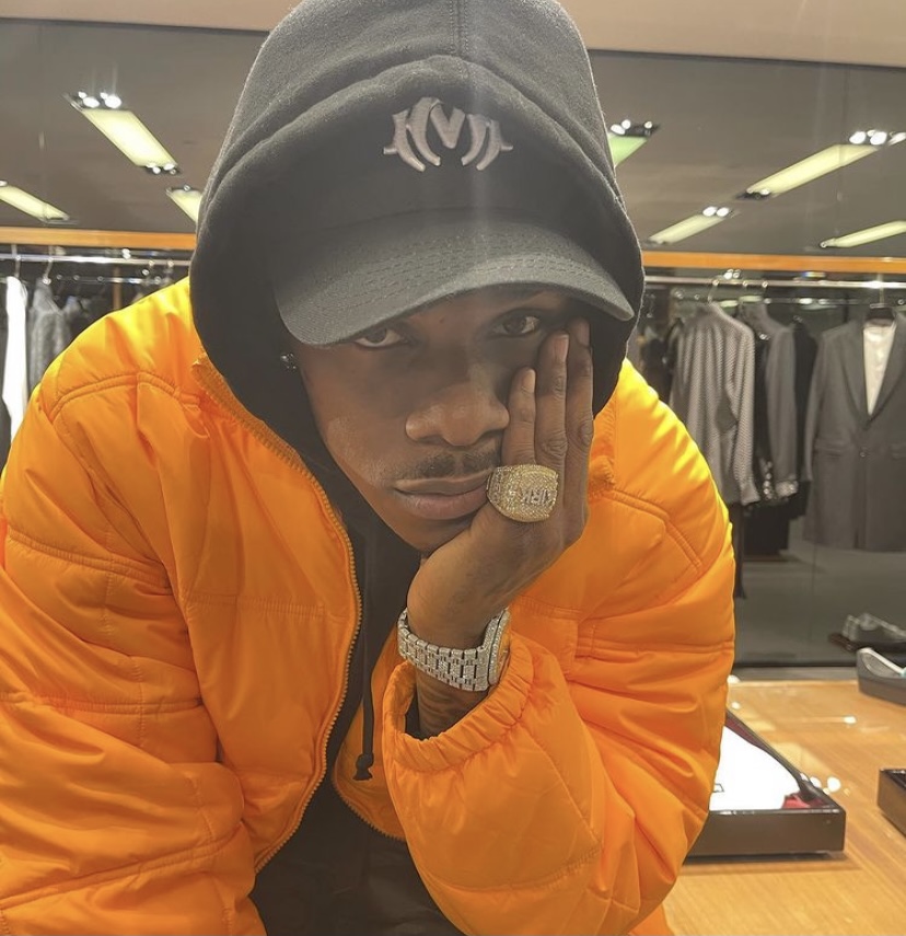 DaBaby seemingly bored at a store.