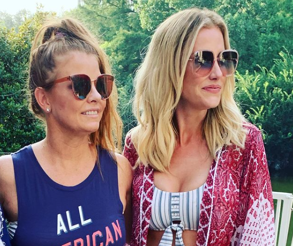 Brandi Redmond and Stephanie Hollman wear sunglasses.