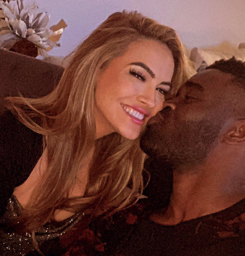 Chrishell Stause gets a kiss from Keo Motsepe.