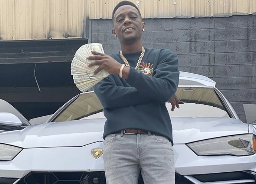 Boosie shows off his stack of money.