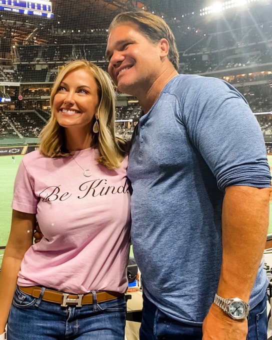 Stephanie Hollman wears pink top as Travis wears blue.