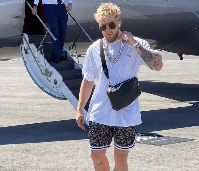 Paul in front of his private jet.