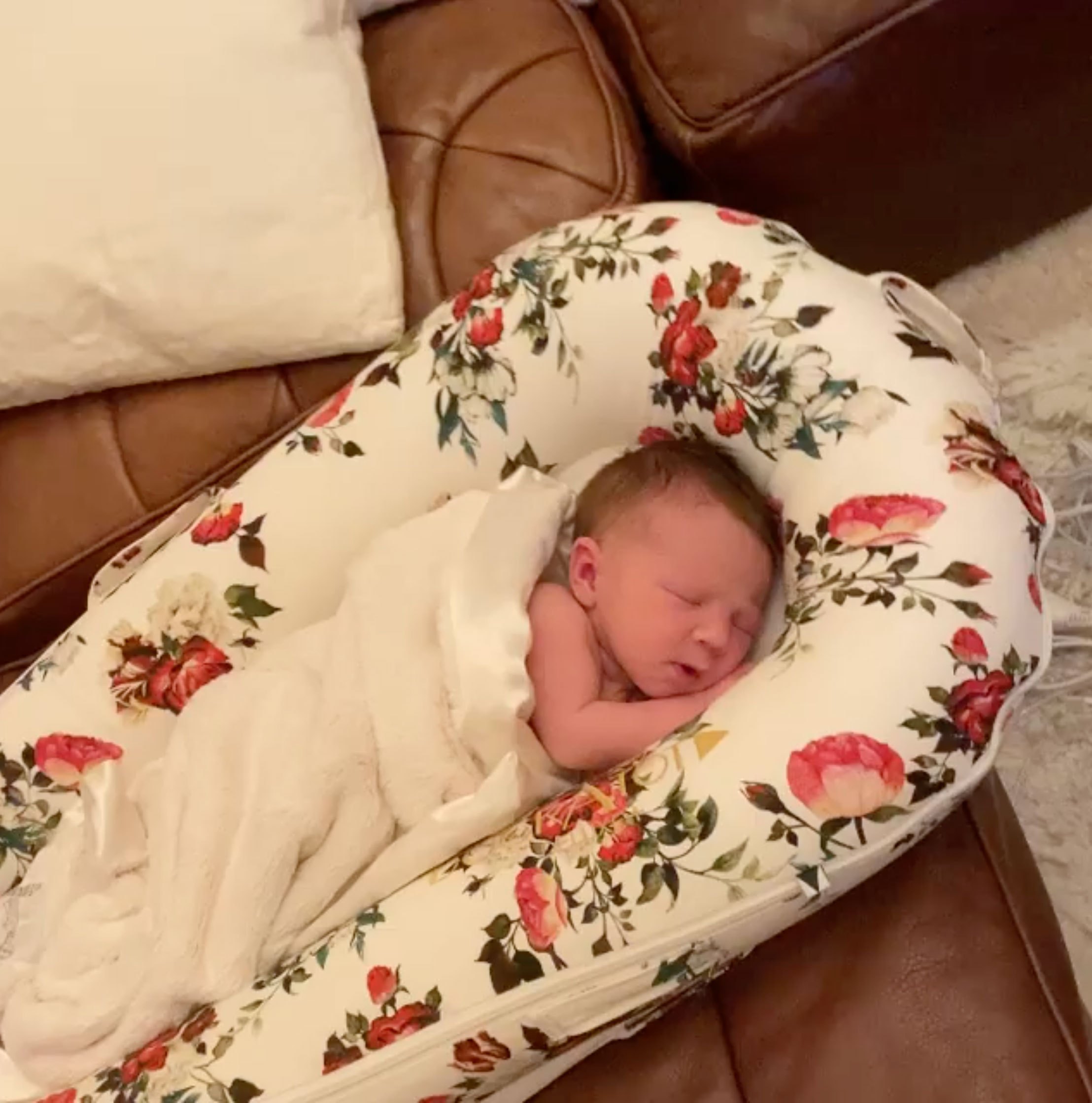 Stassi Schroeder shares a video of daughter Hartford on a pillow.