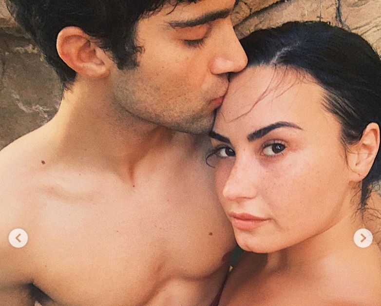 demi lovato being kissed by max ehrich shirtless