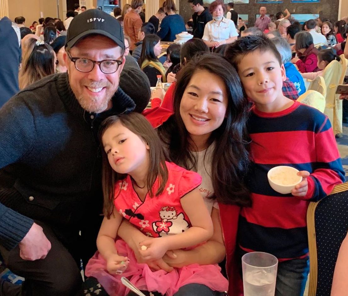 Crystal Kung Minkoff and husband Rob enjoy a meal with their kids.