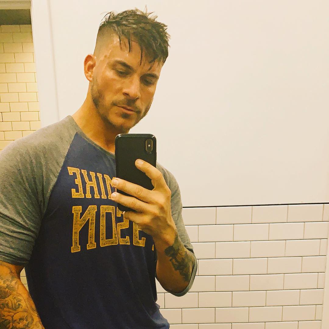 A photo of Jax Taylor posing for a selfie in front of a mirror, and he looks amazing.