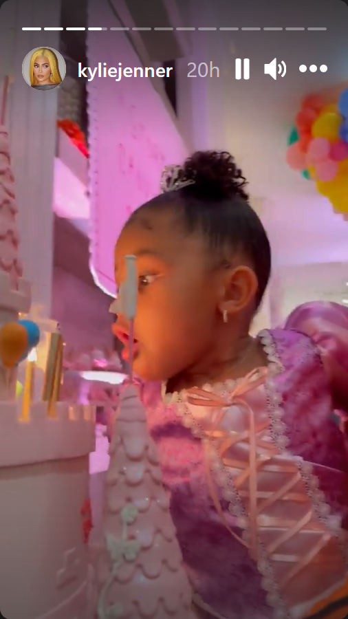 Stormi blowing candles