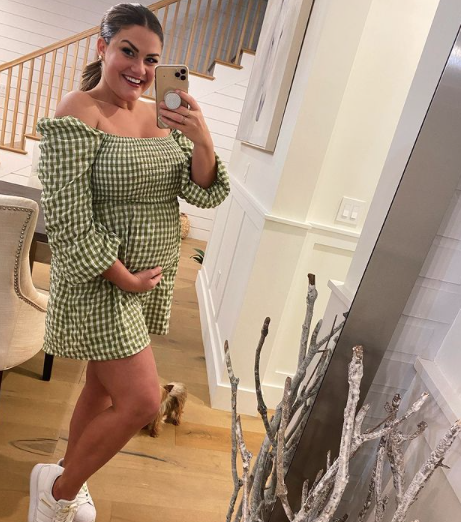 Brittany Cartwright wears a green checkered dress.