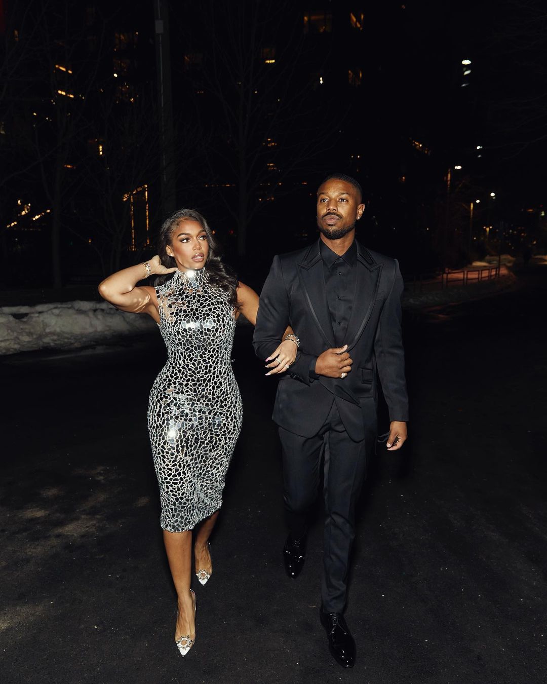 An incredible photo showing Lori Harvey and Michael B. Jordan out at night in amazing outfits and they look gorgeous.