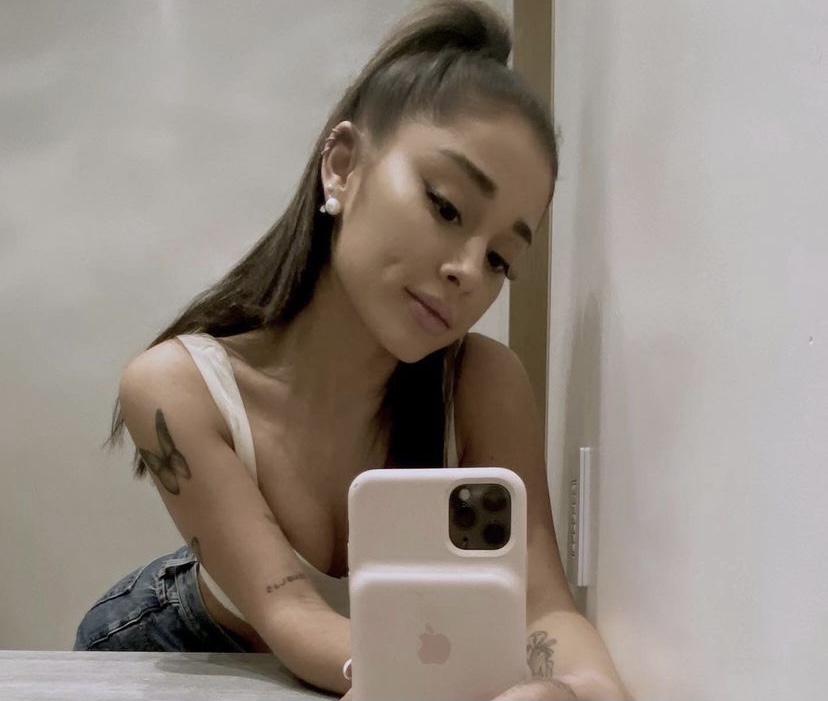 Ariana taking a selfie.