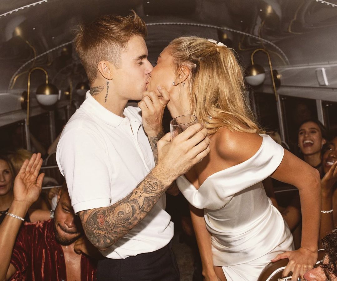 A photo showing Justin Bieber and Hailey Baldwin kissing each other on a bus.