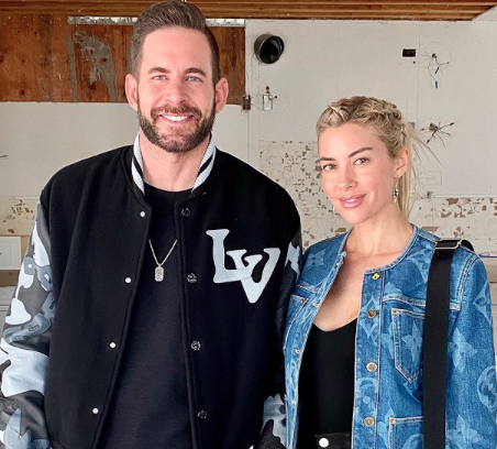 Tarek El Moussa and Heather Rae Young wear Louis Vuitton jackets.
