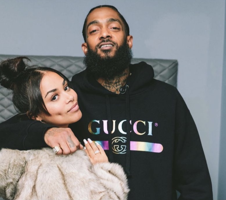 London with her late boyfriend and west coast legend, Nipsey Hussle.