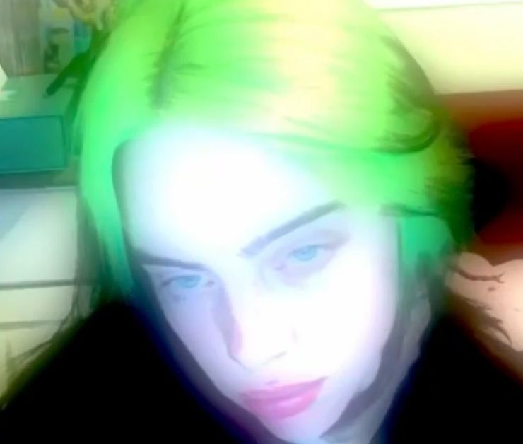 Billie Eilish with glowing green hair