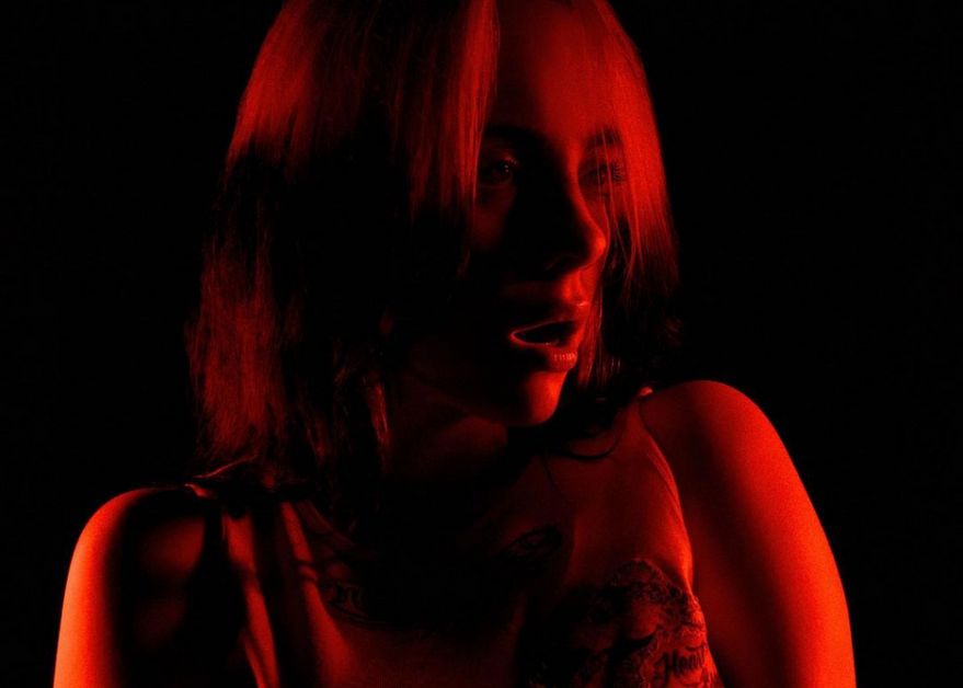 Billie Eilish with red light