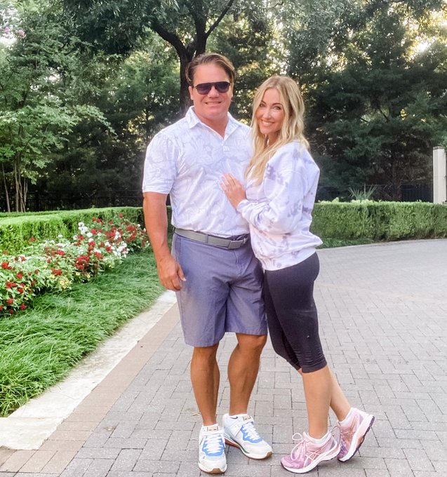 Stephanie Hollman and Travis Hollman wear tennis shoes and tie dye tops.