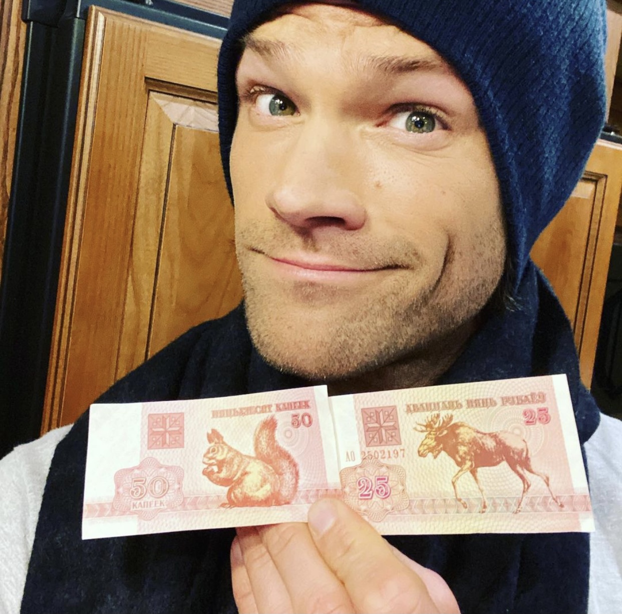 Jared Padalecki poses with money