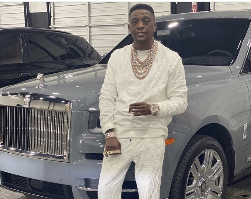 Boosie in front of his Rolls Royce.