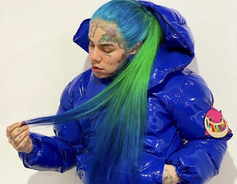 Tekashi 6ix9ine showing off his colorful hair.