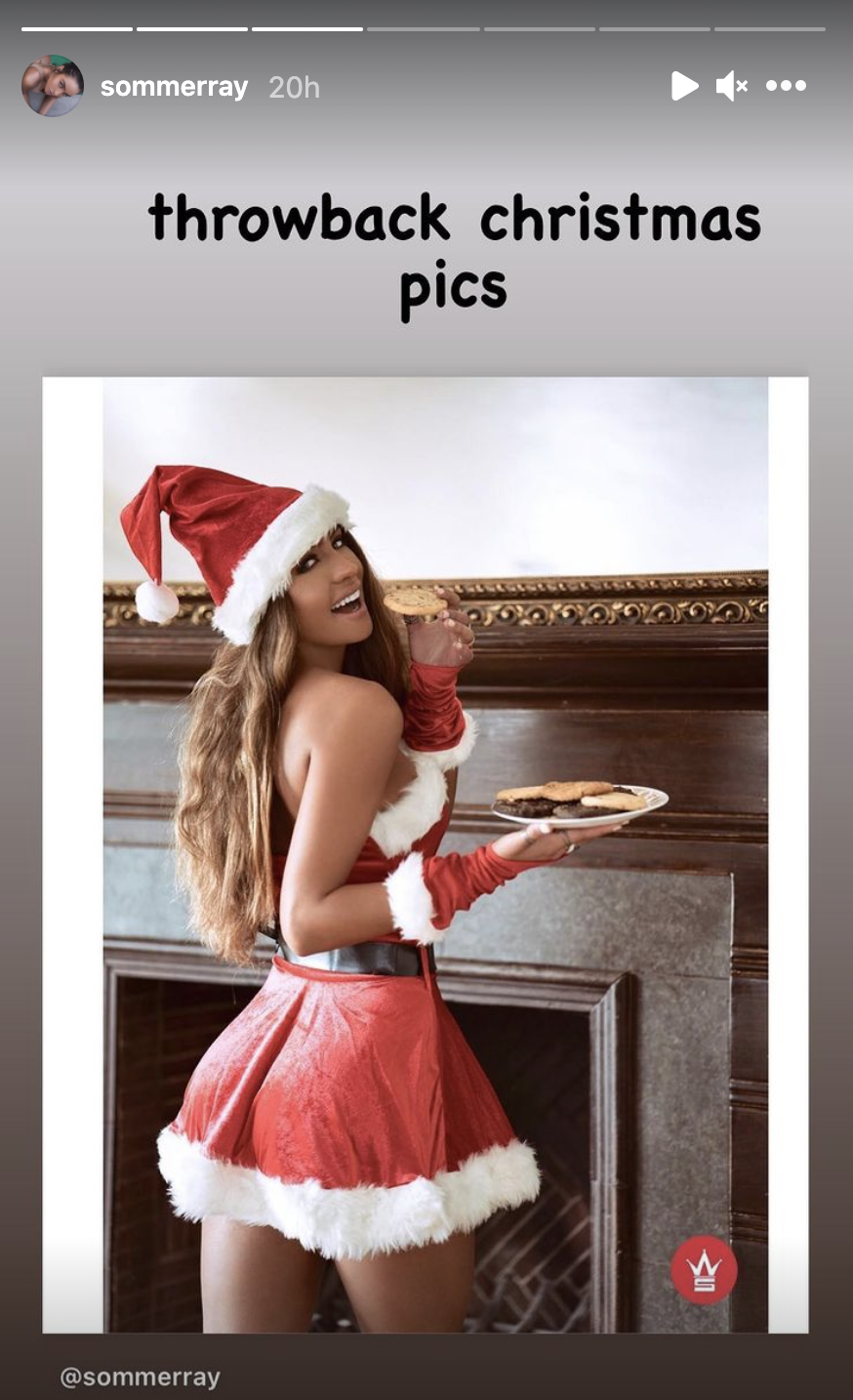 Sommer Ray posting a sexy throwback pic on her story featuring herself wearing a sexy santa costume.