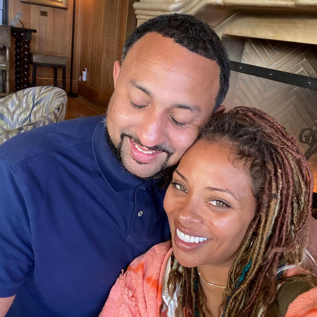 A photo showing Eva Marcille and Michael Sterling sharing a warm embrace as they pose for a selfie.