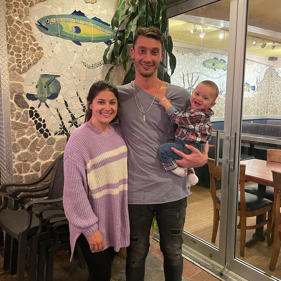 A photo of Loren and Alexei Brovarnik and their son, Shai during an outing and they look incredible.