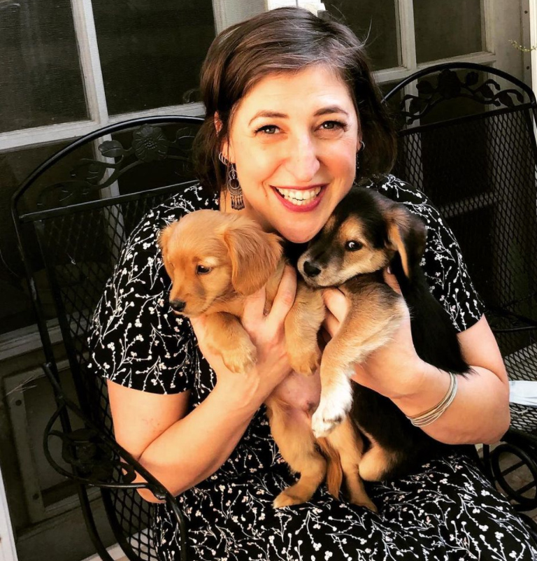 Mayim Bialik hugging puppers